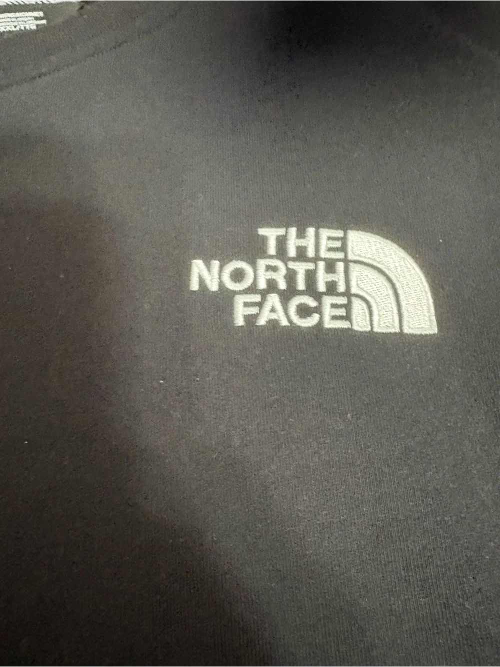 The North Face size XXL men’s black crewneck sweatshirt with elastic and toggles